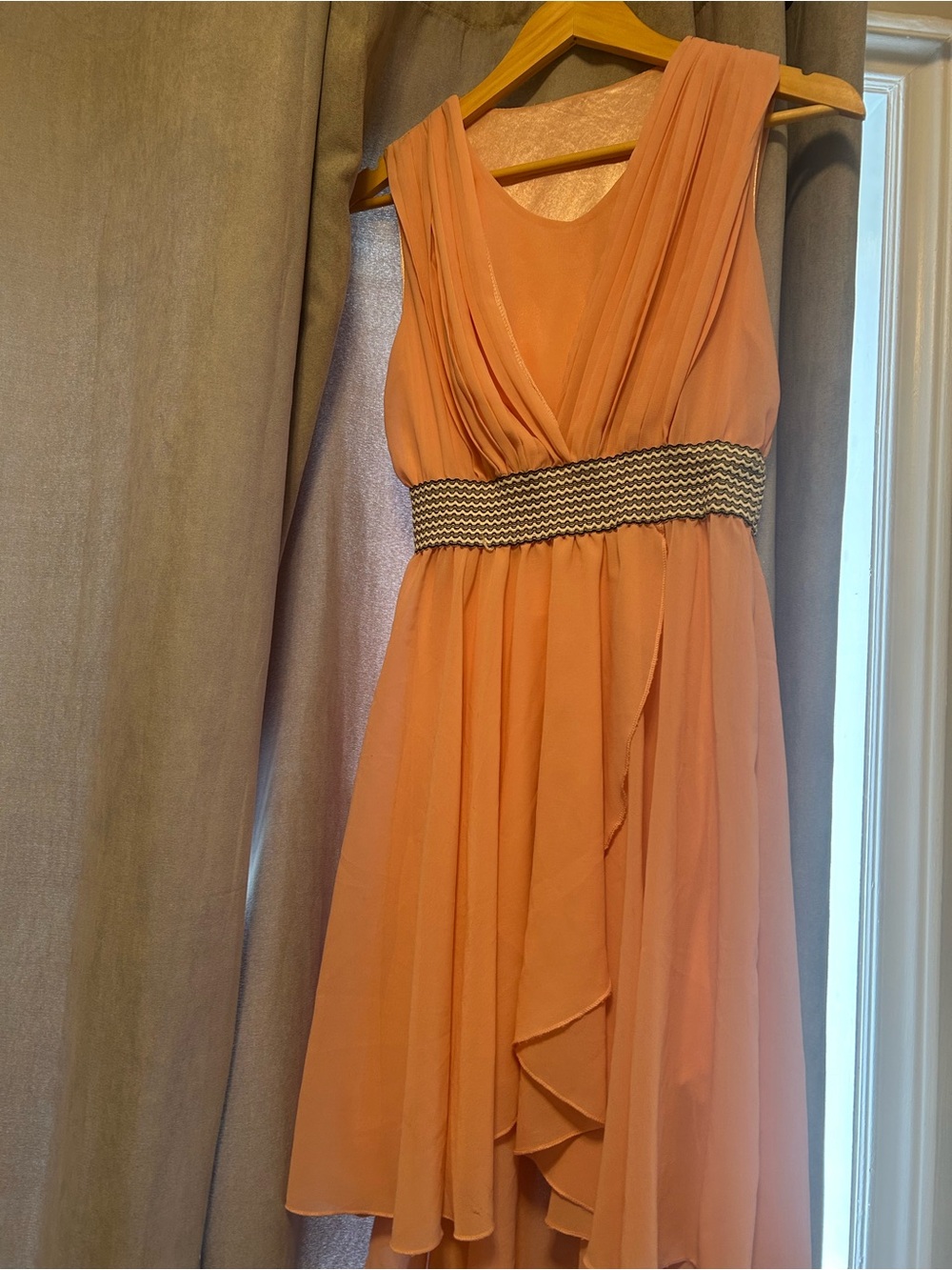 Sleeveless Coral Chiffon Wrap-Front Dress with Decorative Waist